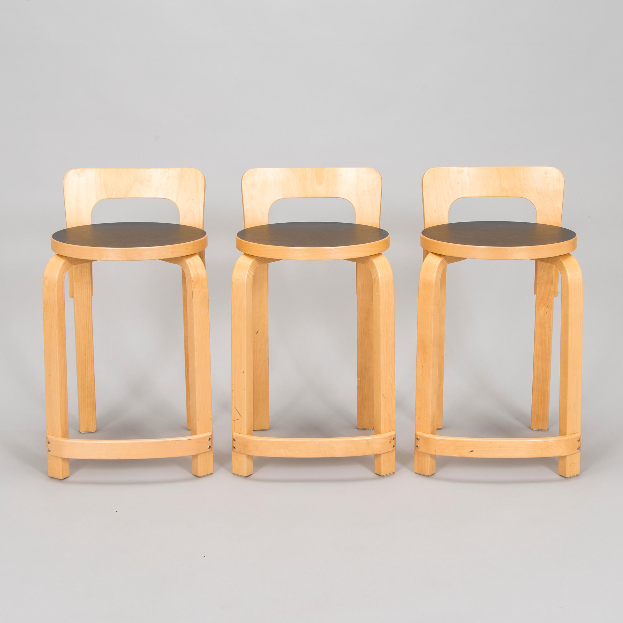 Alvar Aalto, a table and three chairs, Artek 2006 and 2007.