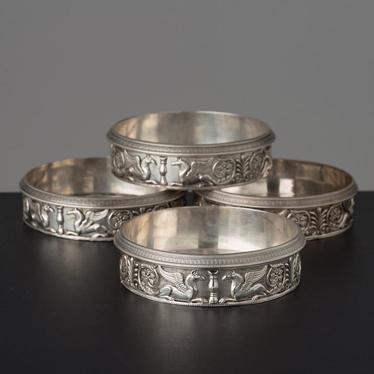 A set of four Swedish silver coasters, mark of Gustaf Möllenborg, Stockholm 1825.