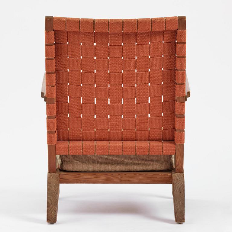 Axel Einar Hjorth, a stained pine "Väddö" easy chair, Nordiska Kompaniet, Sweden, 1930s-40s.