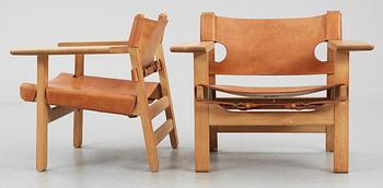 A pair of Børge Mogensen 'The Spanish Chair' in oak and leather by Fredericia Stolefabrik, Denmark.