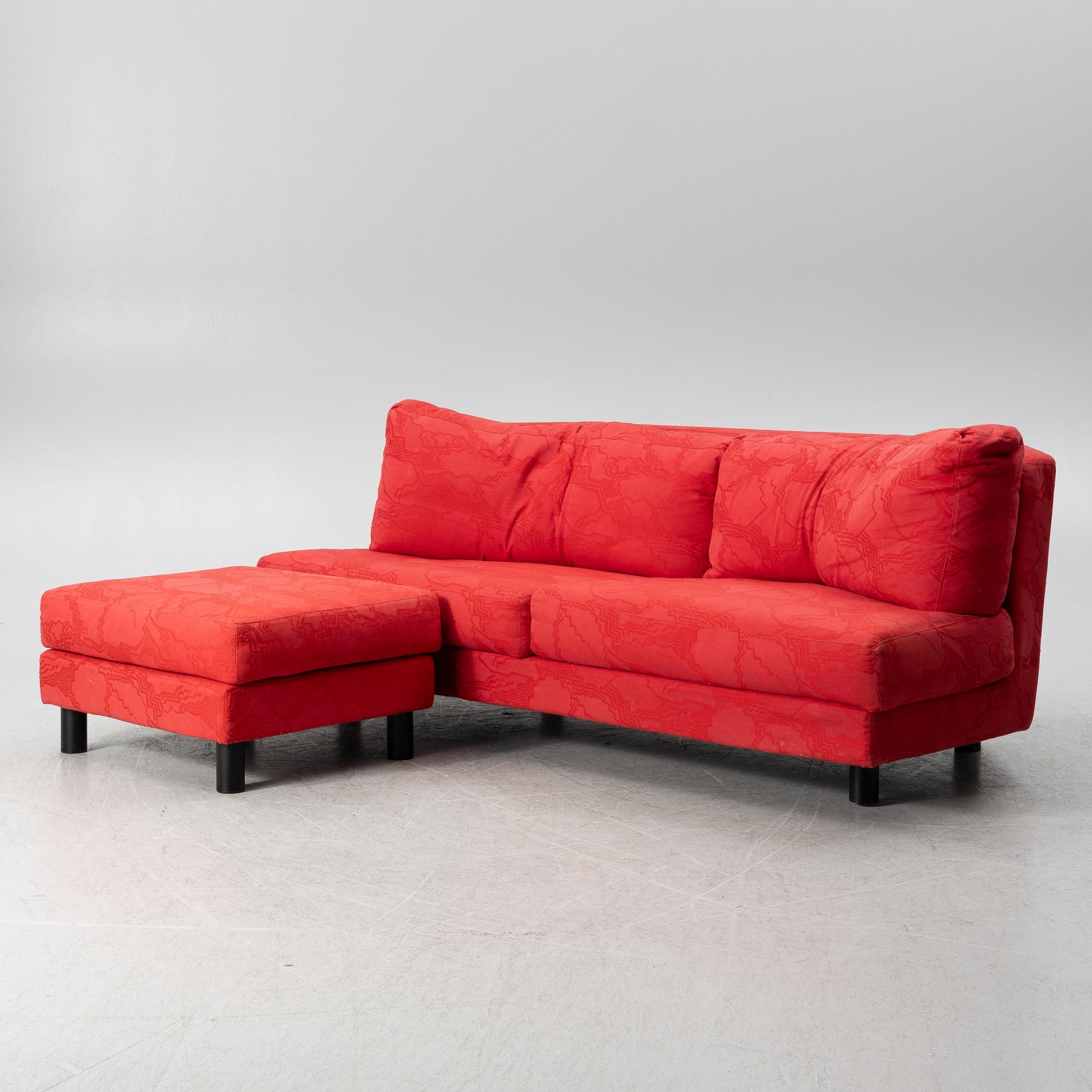 Sofa and footstool, Eilersen, Denmark late 20th Century.