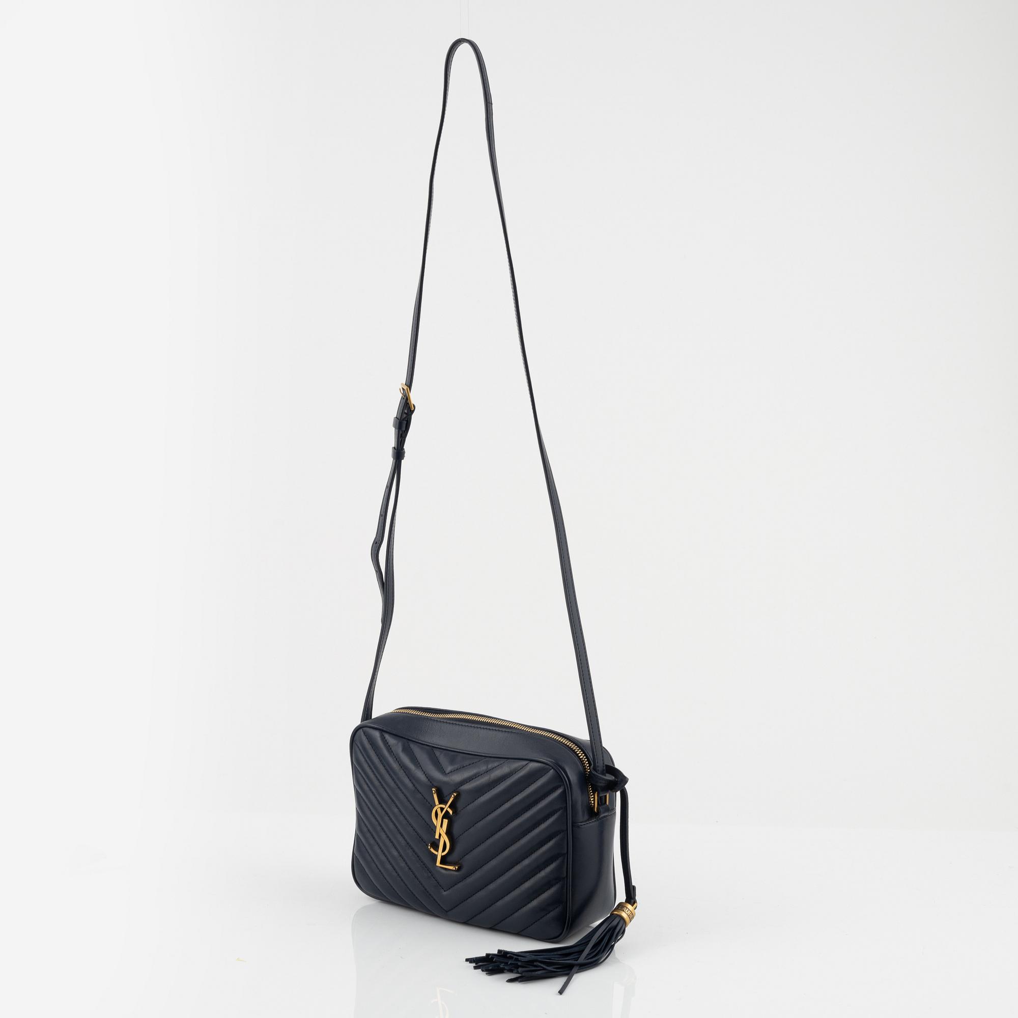 Yves Saint Laurent, a quilted navy leather 'Lou Camera Bag'.
