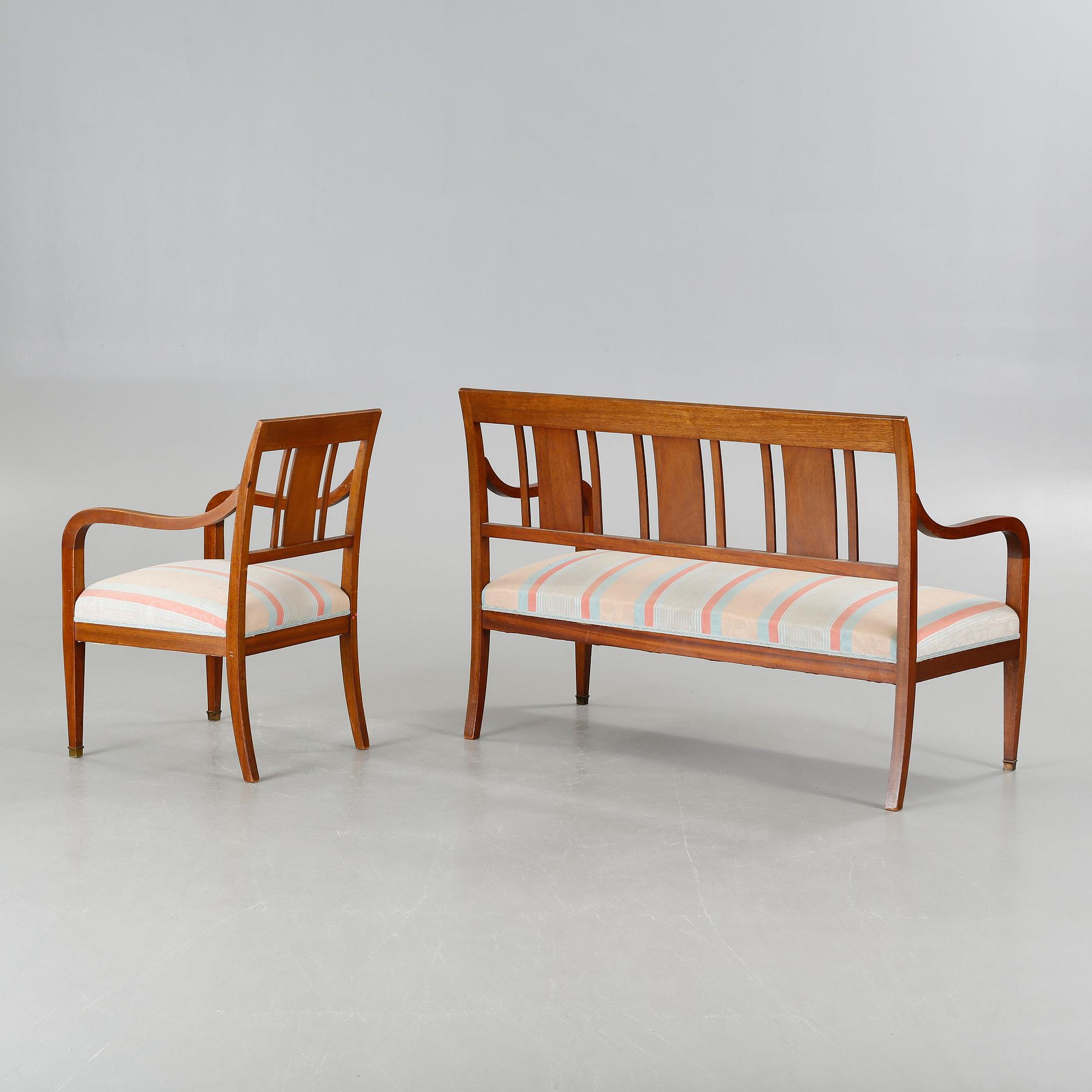 A sofa, six chairs and one table in Swedish Karl-Johan style, made in the first half of the 20th century.