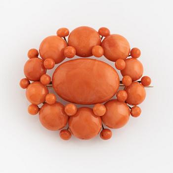 Coral brooch.