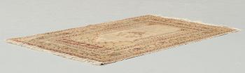 MATTO, an antique silk Tabriz, ca 165 x 118,5-111,5 cm.