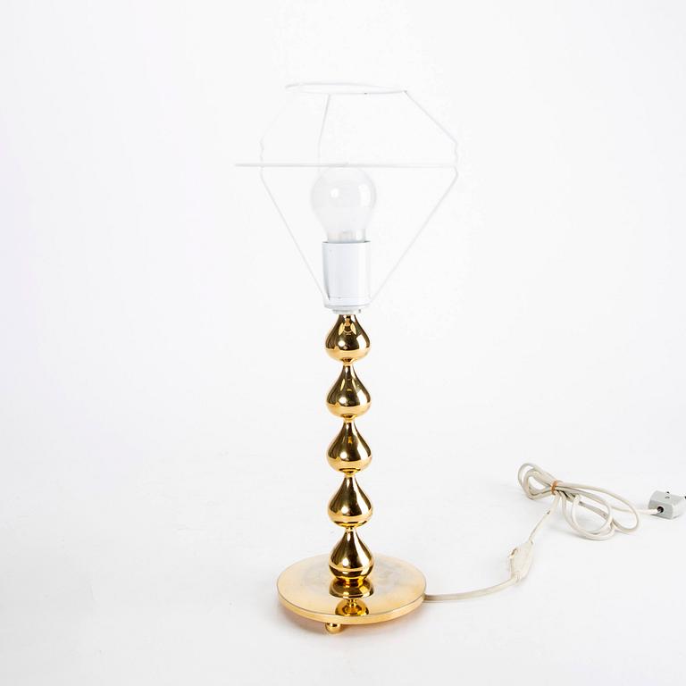 A pair of 24 carat gold plated "Teardrop" table lamps by Hugo Asmussen, Denmark, second half of the 20th century.
