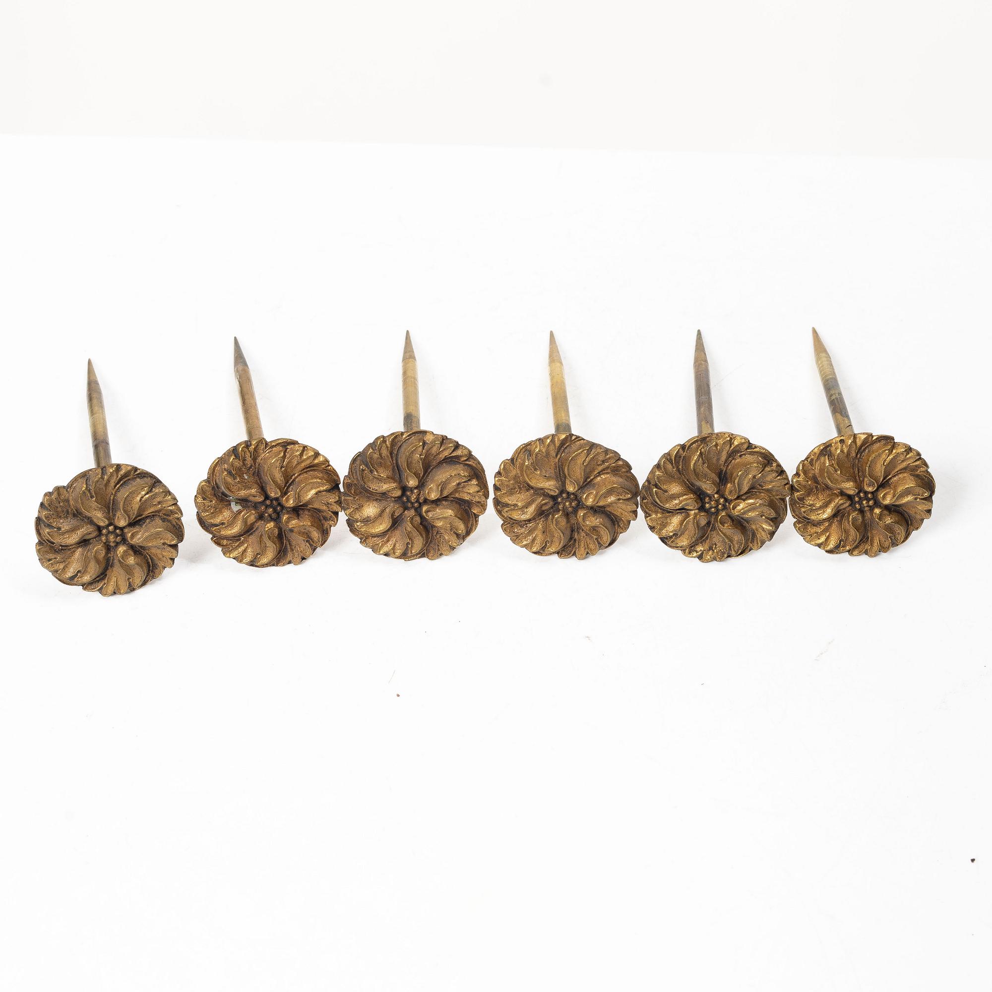Twelve curtain tiebacks, 19th Century.