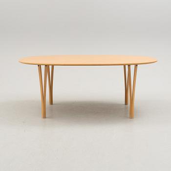 A Bruno Mathsson "Superellips" dinner table for Fritz Hansen, second half of the 20th century.