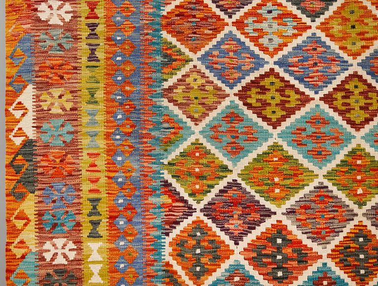 A kilim carpet, approximately 353 x 246 cm.