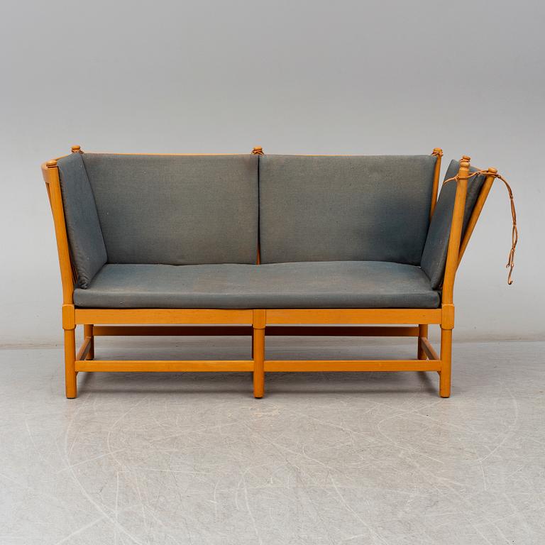 A "Tremme" sofa and armchair, designed by Børge Mogensen, Fritz Hansen, second half of the 20th century.