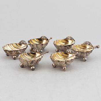 A set of six German parcel-gilt silver 800 salt cellars in fitted case.