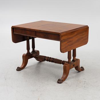 A Swedish Empire twin flap-top mahogany table, first part 19th Century.