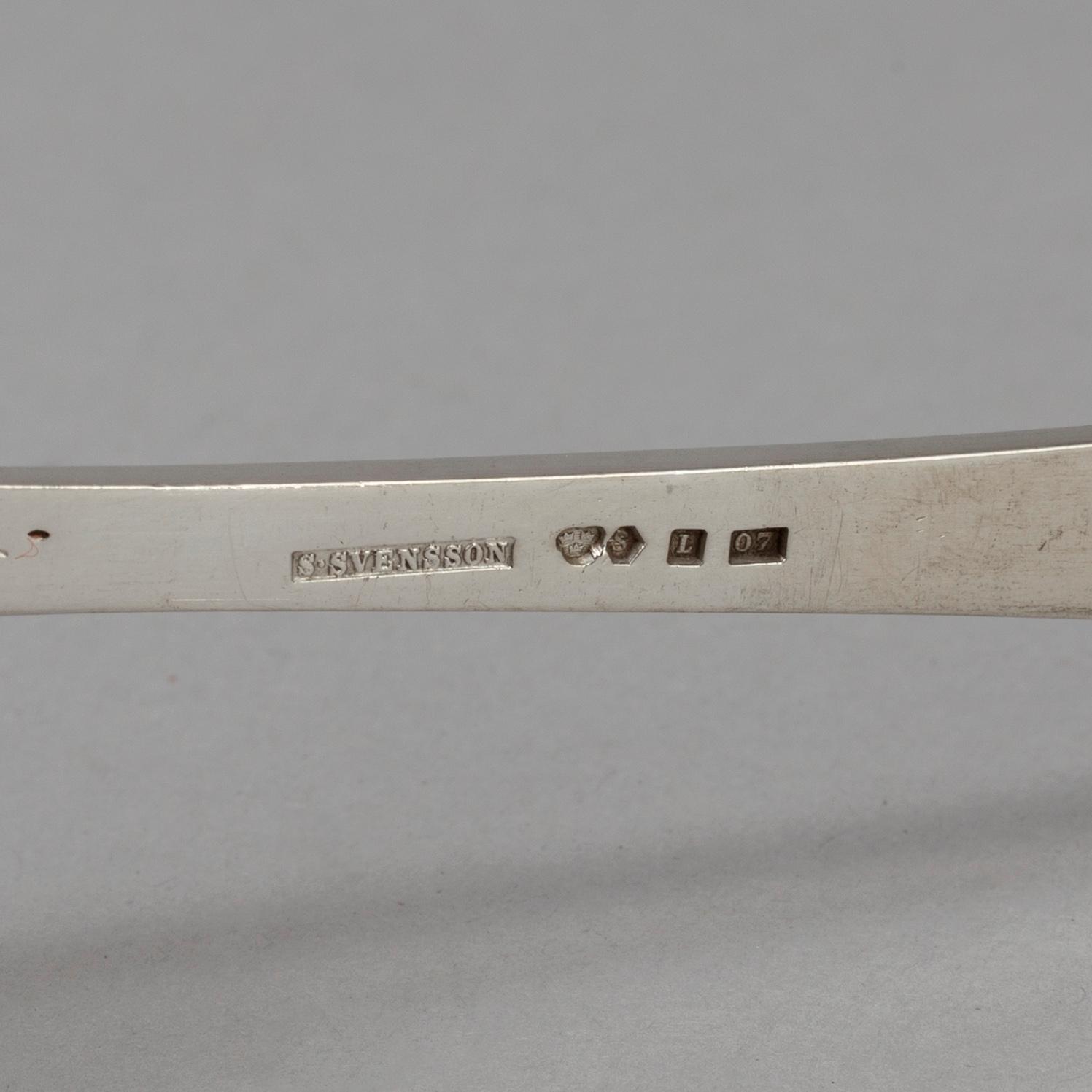 A bowl with a lid and a spoon for sugar, silver. Including CG Hallberg, Stockholm 1900. Total weight 484 grams.