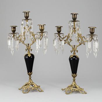 A pair of Victorian brass candelabra from around year 1900.
