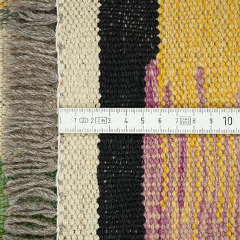 A kilim rug, 247 x 170 cm.