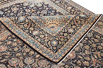 A Kashan carpet, c. 397 x 300 cm.