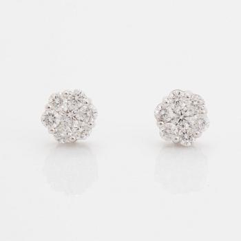 Brilliant-cut diamond earrings.