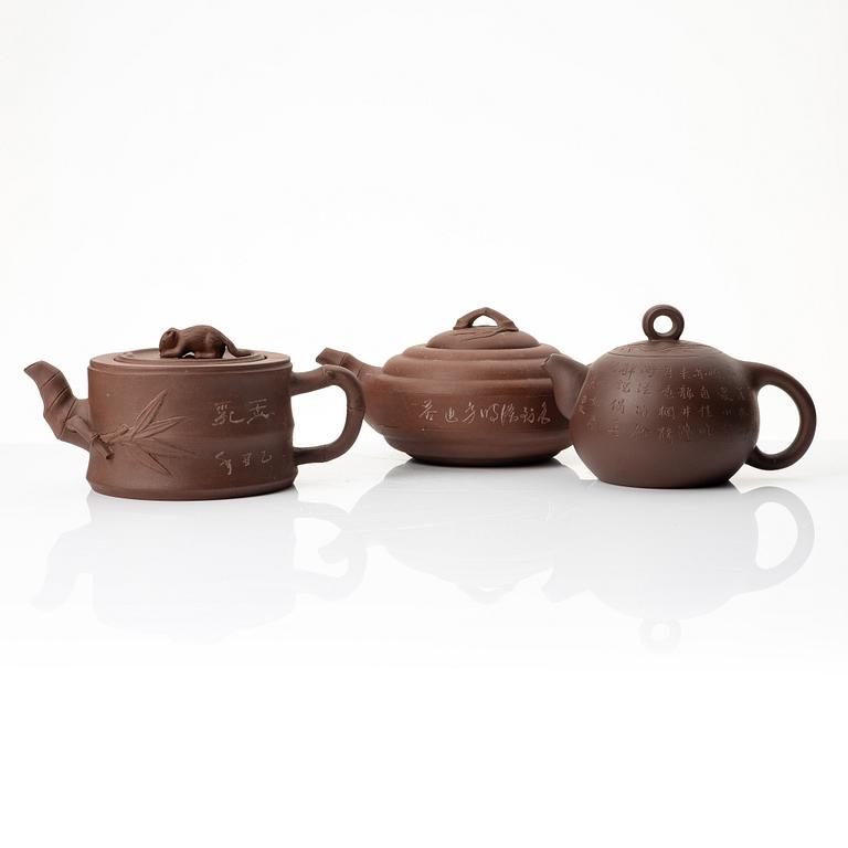 A group of three Chinese yixing teapots, 1960-80s.