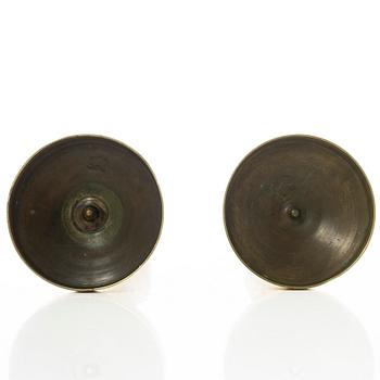 A pair of French Empire candlesticks, early 19th century.