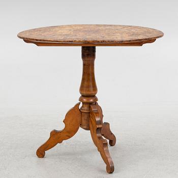 A folding table, 19th Century.