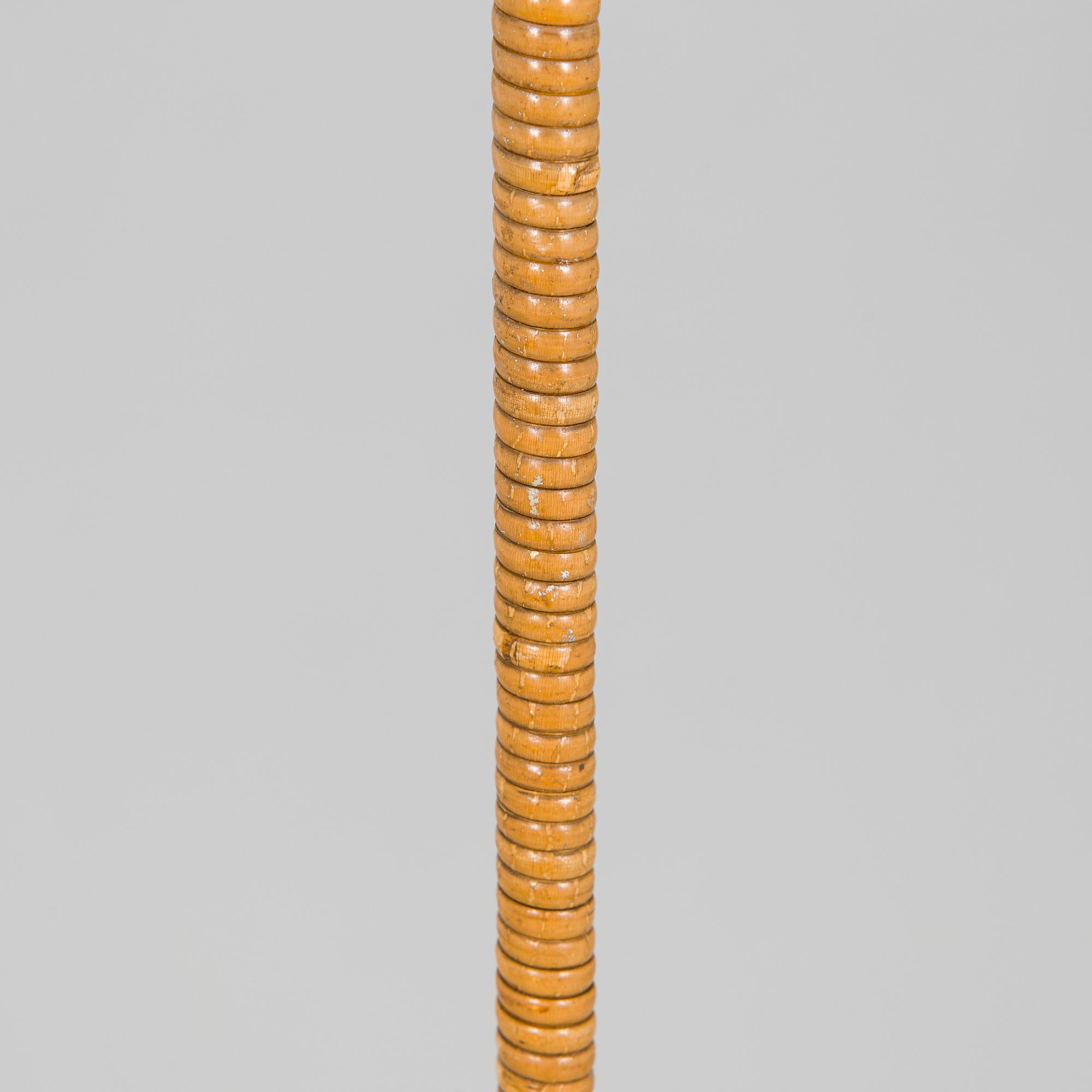 Paavo Tynell, a mid-20th century K10-10 floor lamp for Taito.
