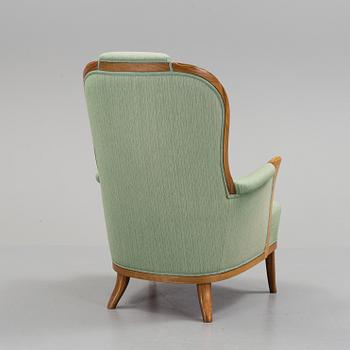 a Carl Malmsten "Vår Fru" armchair from the second half of the 20th century.