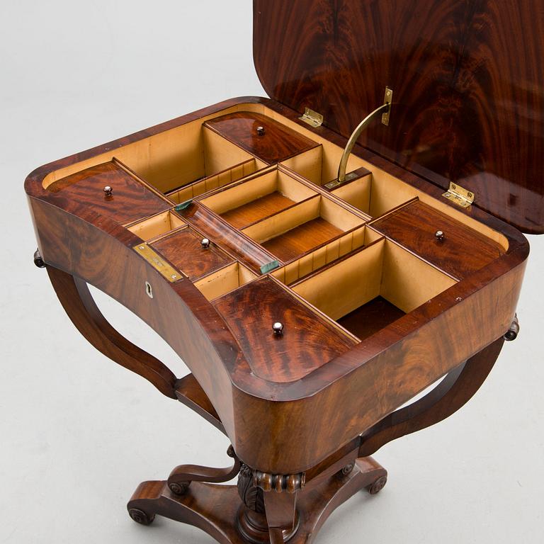 A sewing table from the first half of the 19th century.