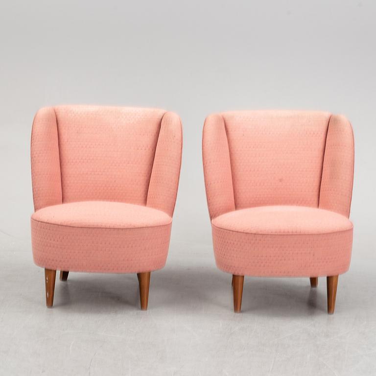 A pair of 1940's easy chairs.