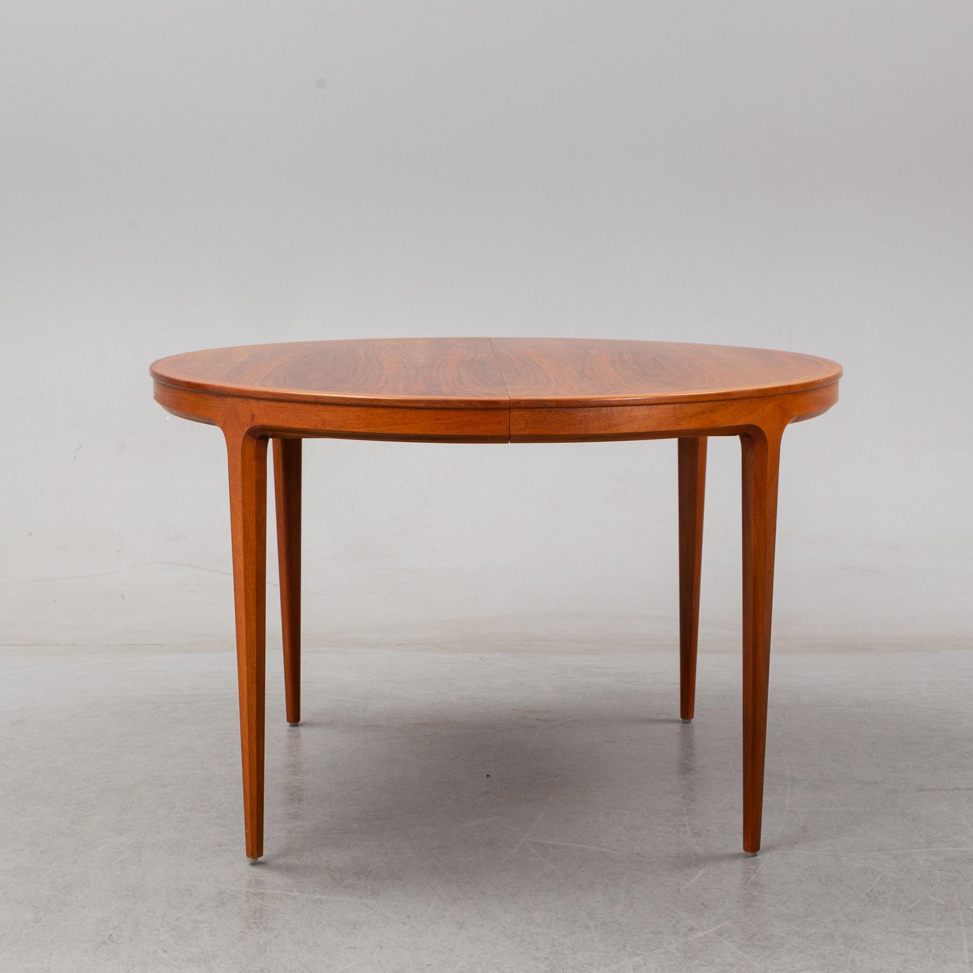 A 1960's 'Diamant' teak dining table by Bertil Fridhagen with two additional leaves.