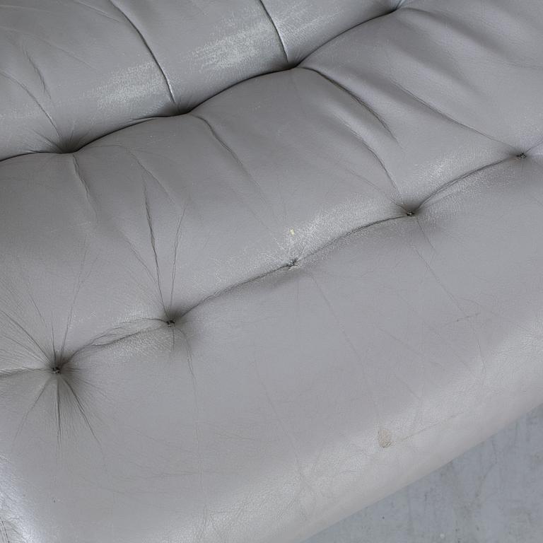 A COUPLE OF BRUNO MATHSSON ARMCHAIRS.