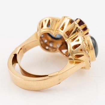 Ring, Evert Lindberg, 18K gold, set with star sapphires and rubies, as well as brilliant-cut and octagonal-cut diamonds.