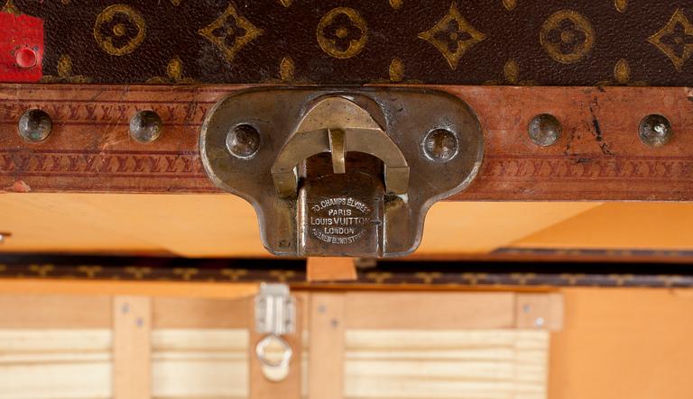 An early 20th cent monogram canvas trunk by Louis Vuitton.