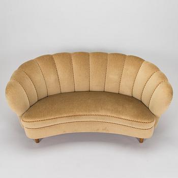 A mid-20th century sofa.