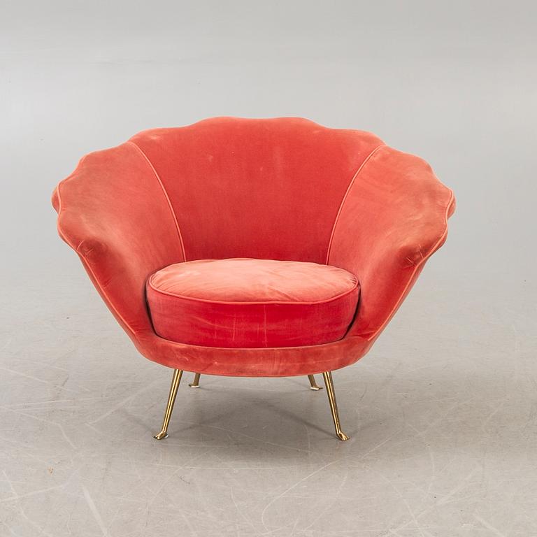 A 21st Edra century pink velvet easy chair.