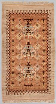 A Scandinavian knotted pile rug  1940/50 ca 303 x 169 cm.
