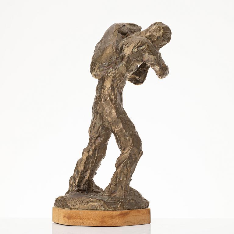 Axel Olsson, manlig gestalt med säck.