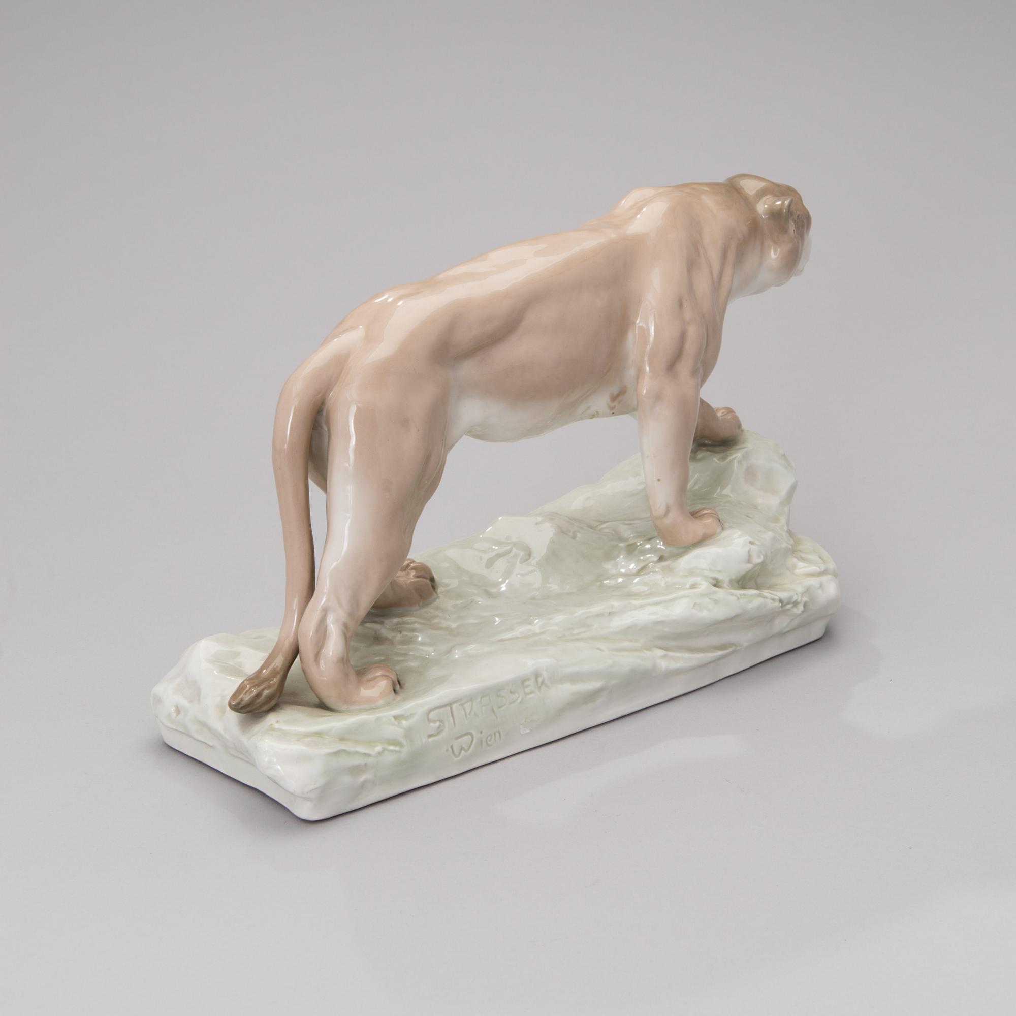 An Amphora porcelain figurine 2882, impressed mark Strasser Wien.