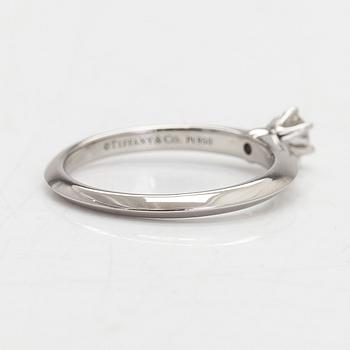 Tiffany & Co, a platinum ring with a diamond 0.19 ct. according to engraving.