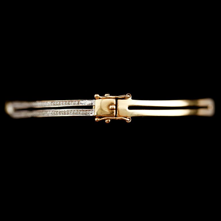 ARMBAND, 18 k guld med briljantslipade diamanter. Total vikt 10 g.