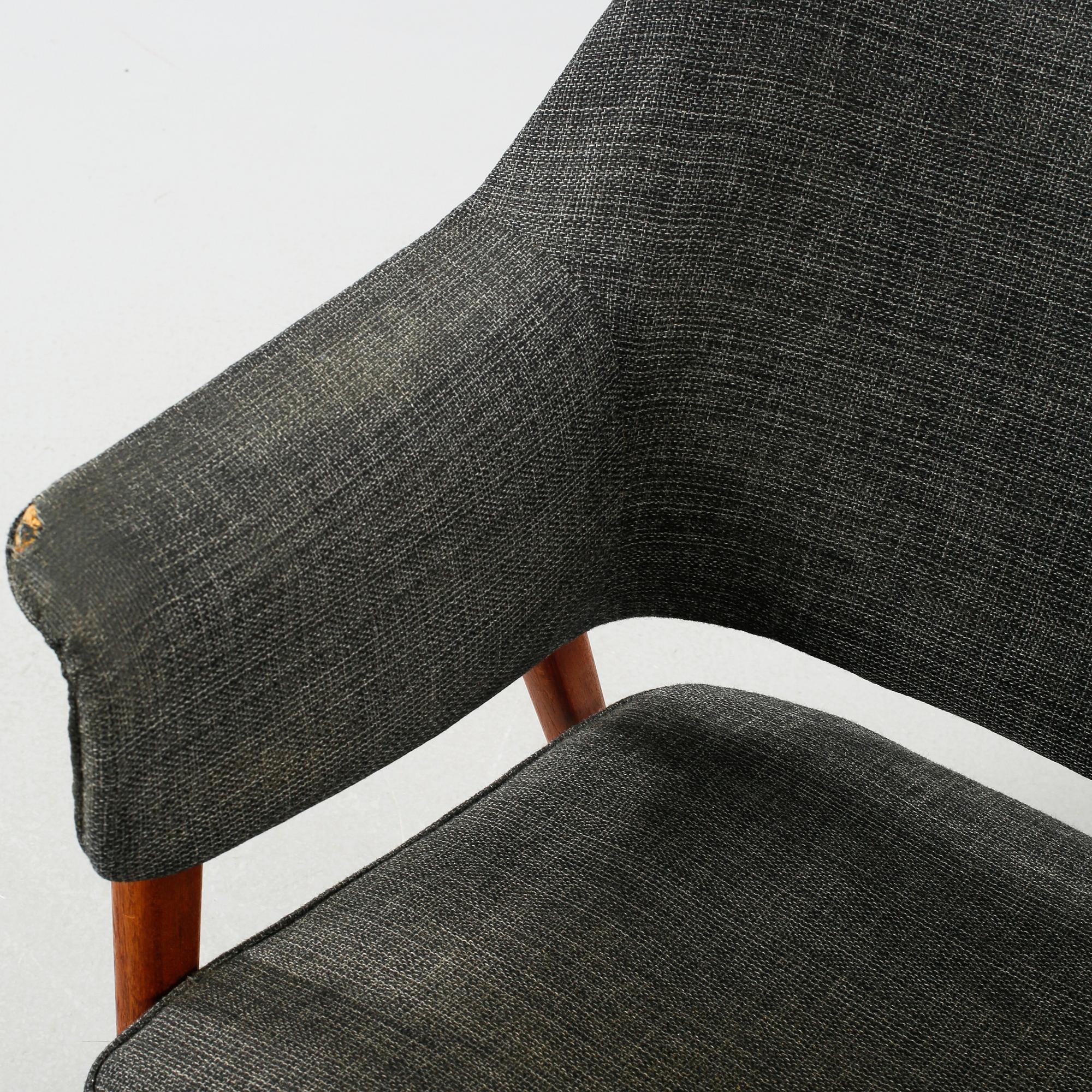 A pair of armchairs designed by Karl-Erik Ekselius for JOC, Vetlanda, made around the middle of the 20th century.