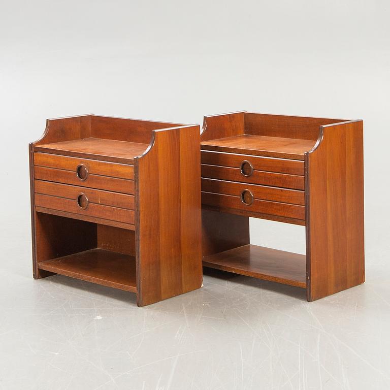 A pair of Italien 1950s/second half mahogany bedside tables.