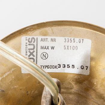A 1960s Luxus brass ceiling pendant.