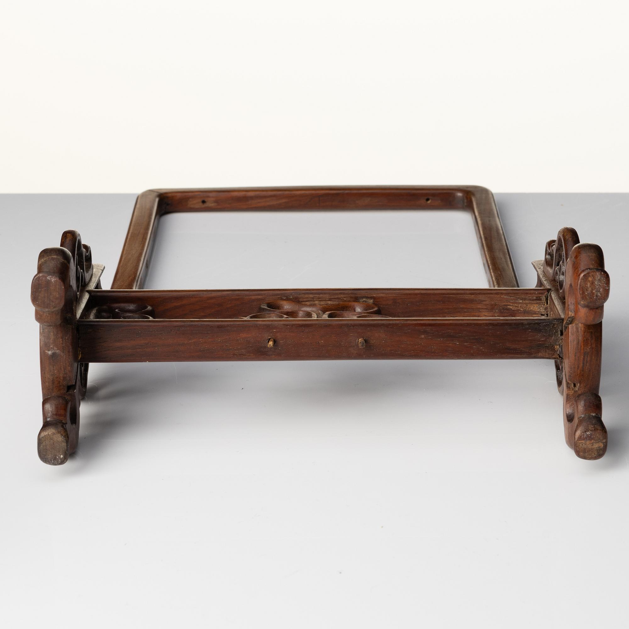 A group of Chinese wooden stands, late Qing dynasty and 21st century.