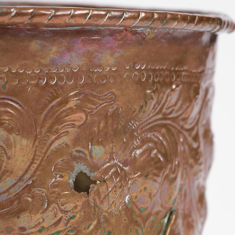 A Swedish baroque repousse copper cauldron, early 18th century.