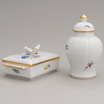 Two Meissen porcelain vases, a platter, an urn and a lidded box from the latter half of 20th century.