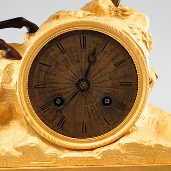 A late empire mantle piece clock, around mid 19th century.