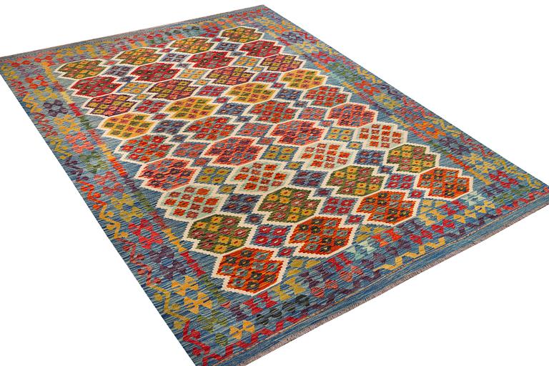 An Afghan Kilim carpet, c. 297 x 206 cm.