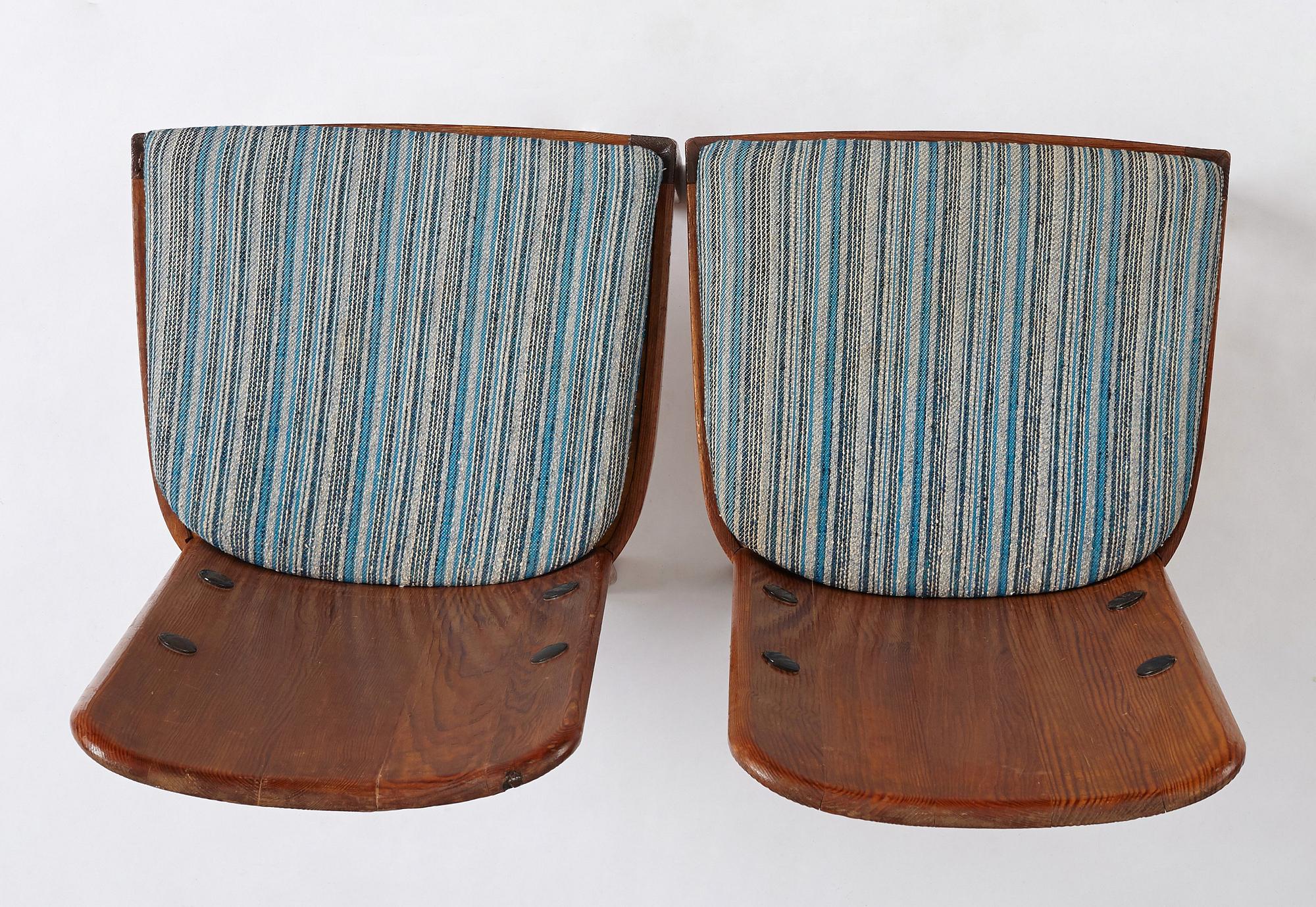 Axel Einar Hjorth, a pair of stained pine "Lovö" chairs, Nordiska Kompaniet, Sweden 1930's.