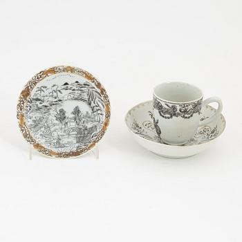 A Chinese grisaille cup and two saucers, porcelain, Qing dynasty, Qianlong (1736-95).