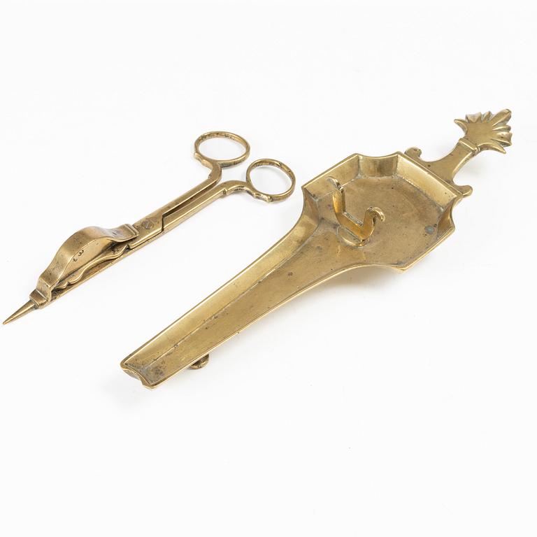 A Swedish/North European baroque brass wick snuffer and tray, circa 1700.